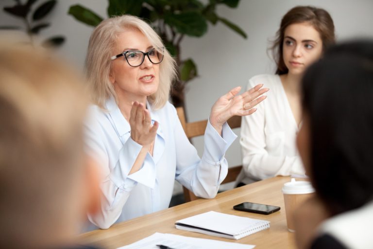 businesswoman leading a meeting in the office